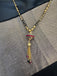 Multicolor Stones ball pendant with a black beads chain