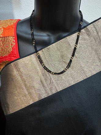 Double line black diamond beads with a gold bead chain