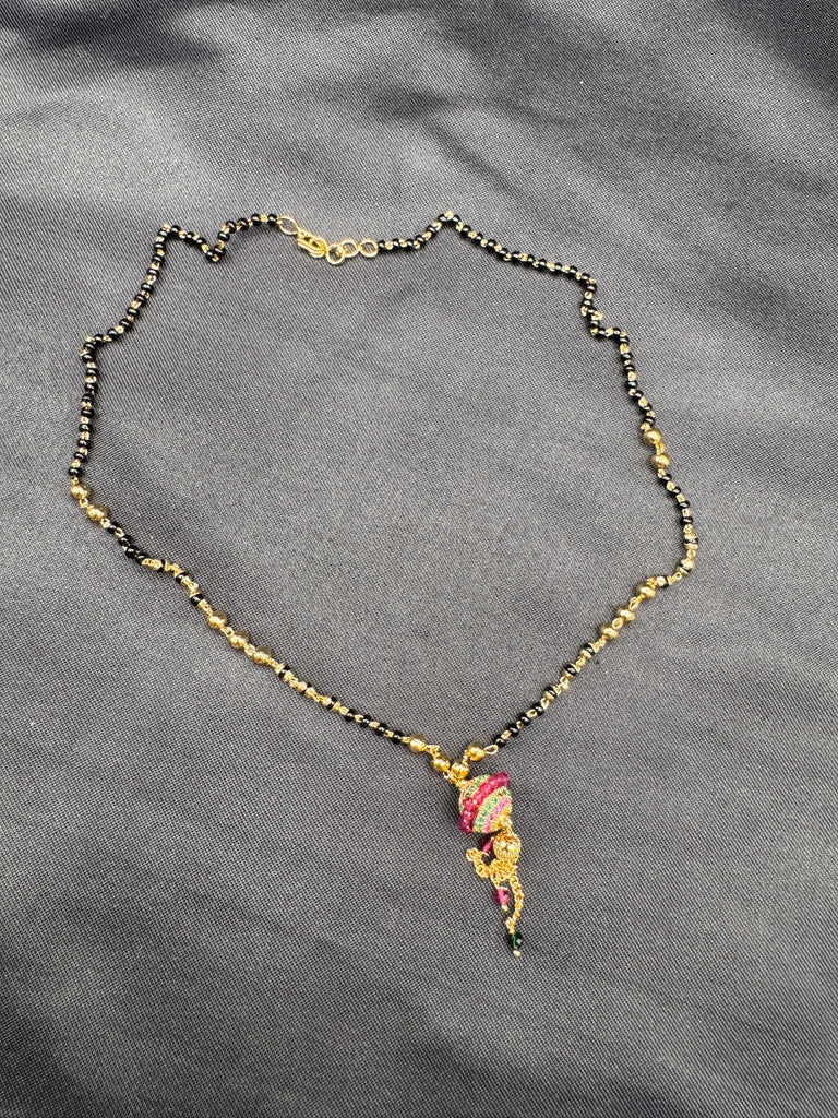 Multicolor Stones ball pendant with a black beads chain