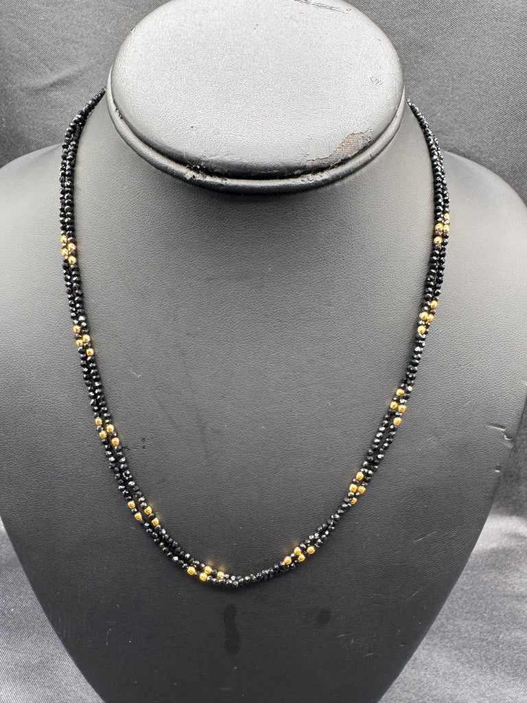 Double line black diamond beads with a gold bead chain