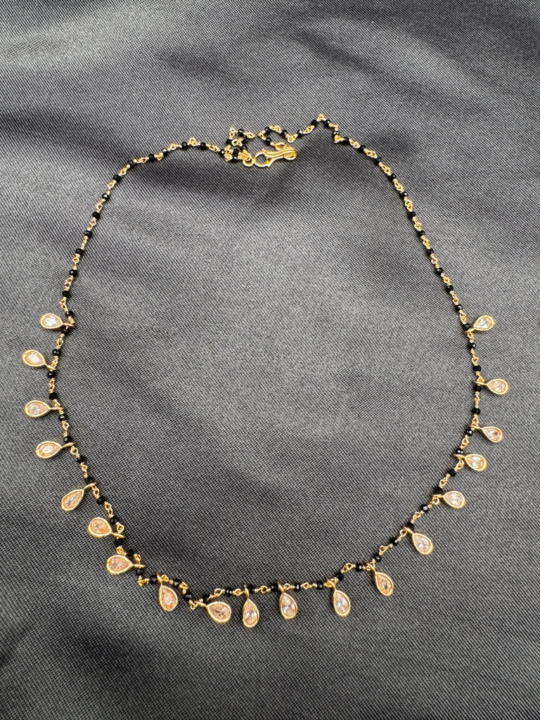 Black diamond beads with cz stones hanging