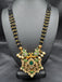 CZ stones and Emerald stones pendant with a bunch of black diamond beads necklace