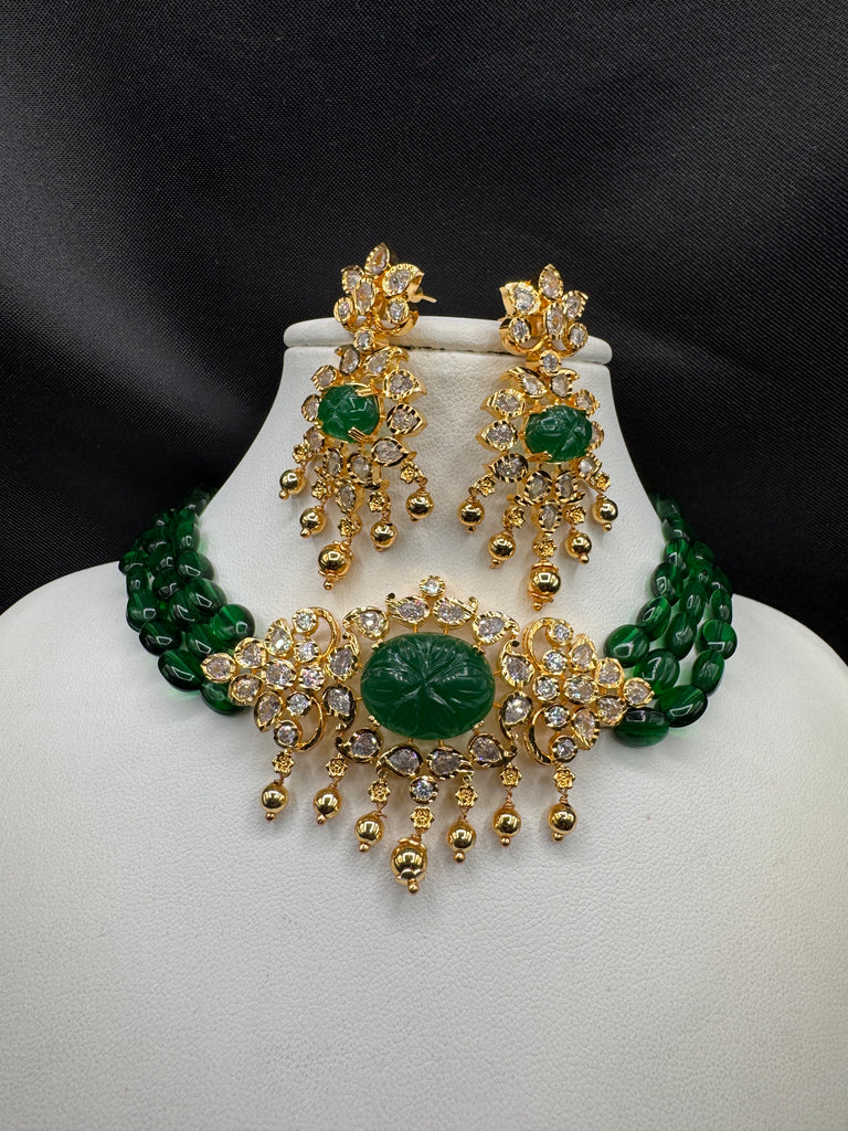 Elegant cz stones and emerald stones pendant set with a matching emerald bead chain