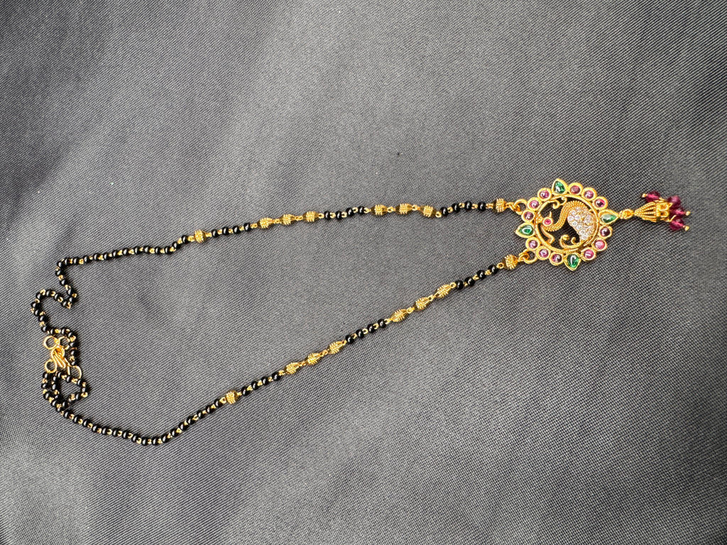 Traditional look peacock design pendant with a black bead chain