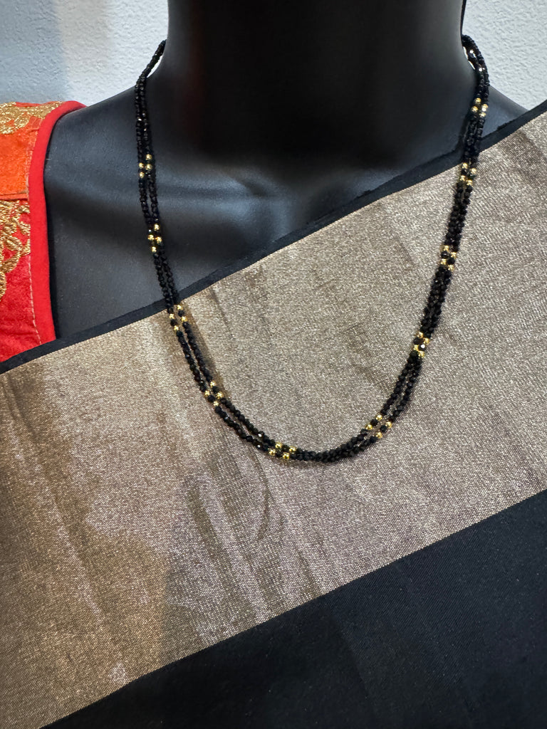 Double line black diamond beads with a gold bead chain