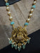 Antique Lakshmi pendant with pumpkin beads and a pearl chain