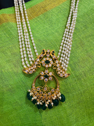 Pearls with chandbali style cz stones pendant with matching earrings