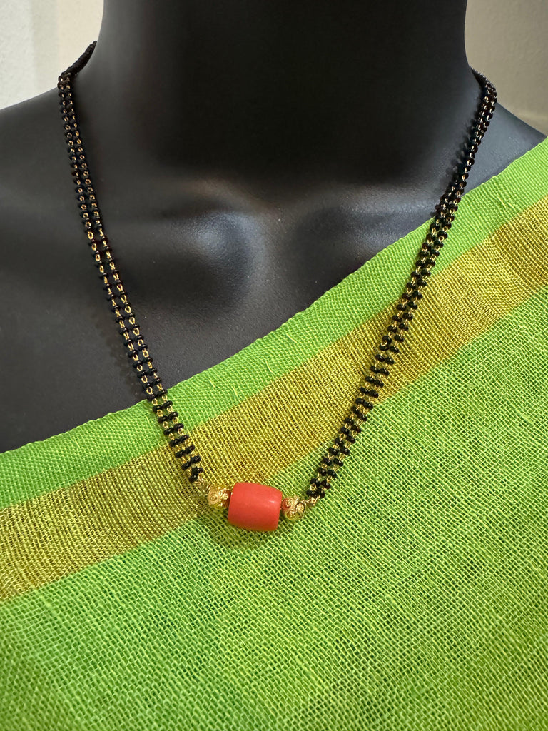 Coral bead with a black beads chain