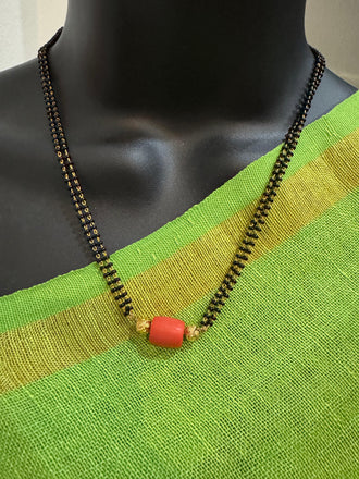 Coral bead with a black beads chain