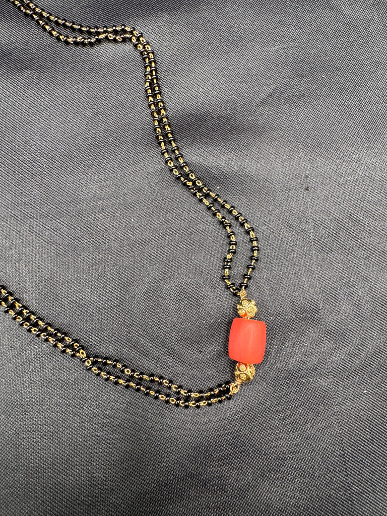 Coral bead with a black beads chain