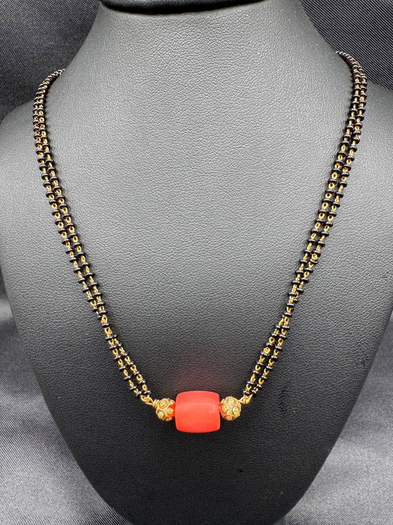 Coral bead with a black beads chain