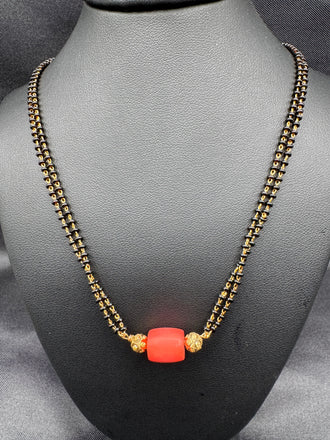 Coral bead with a black beads chain