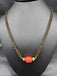Coral bead with a black beads chain