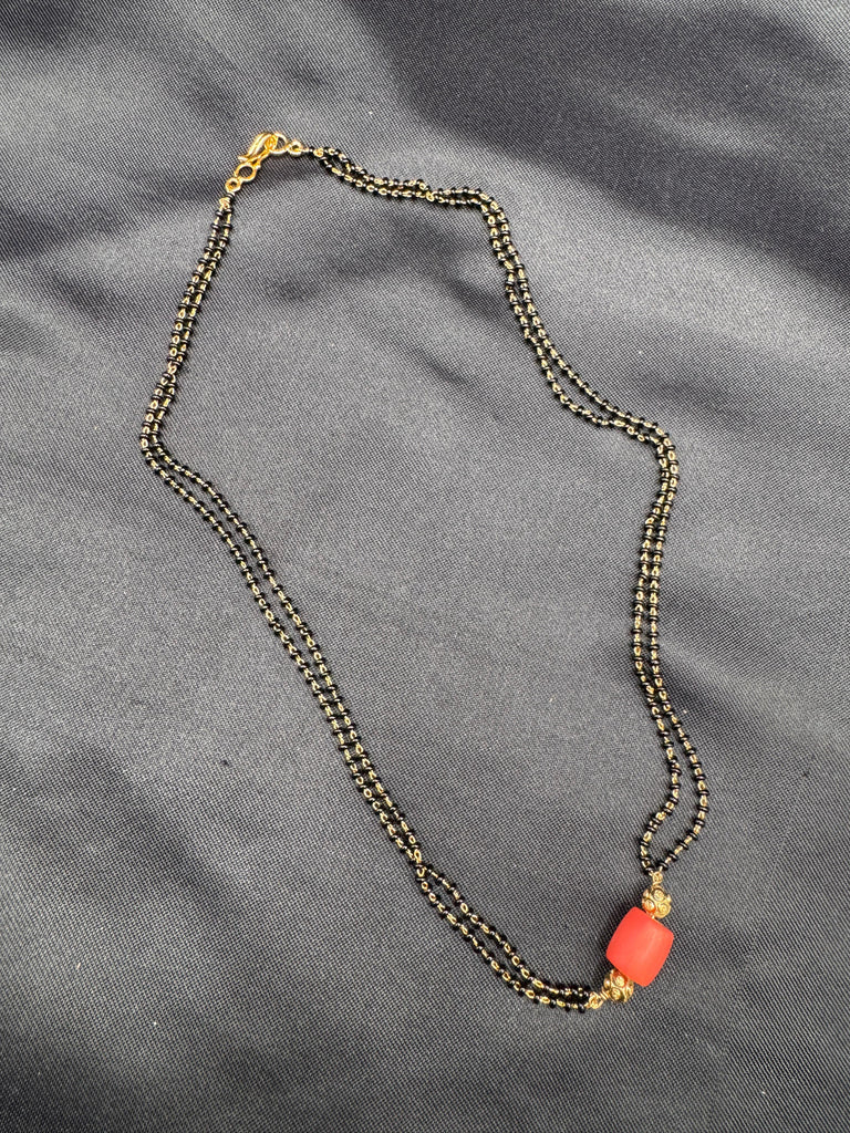 Coral bead with a black beads chain