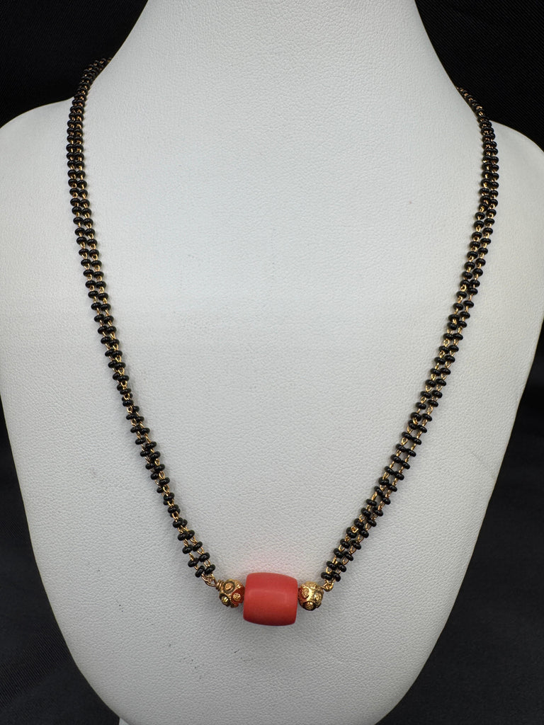 Coral bead with a black beads chain