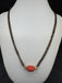 Coral bead with a black beads chain