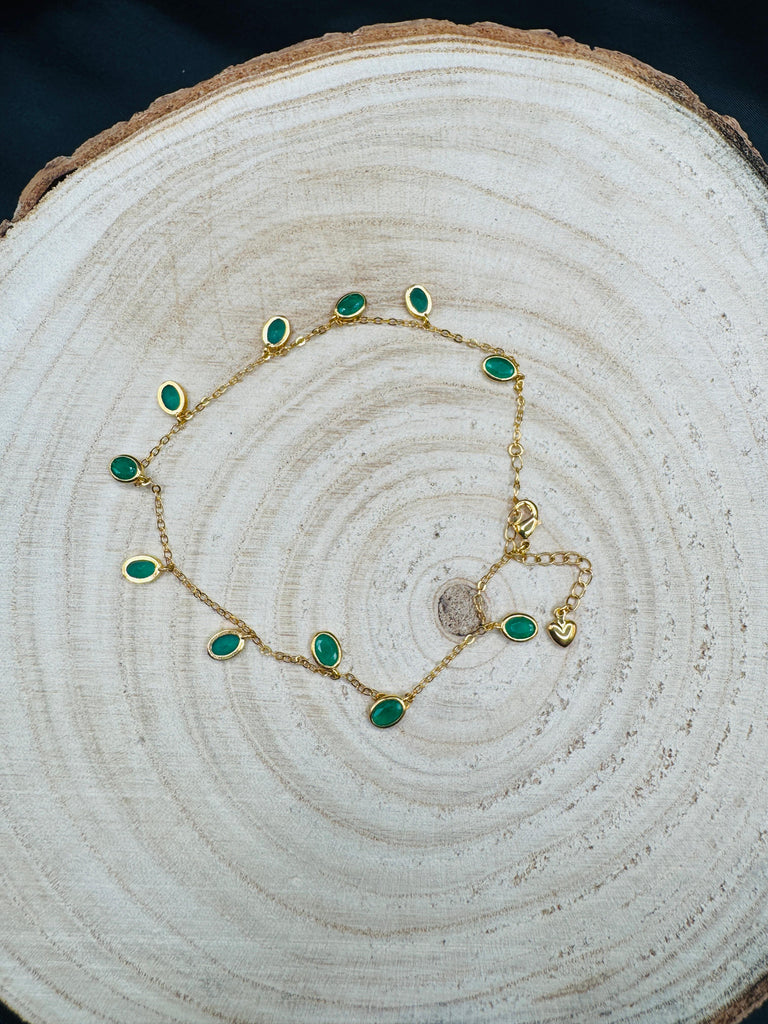 Emerald stone's gold anklet
