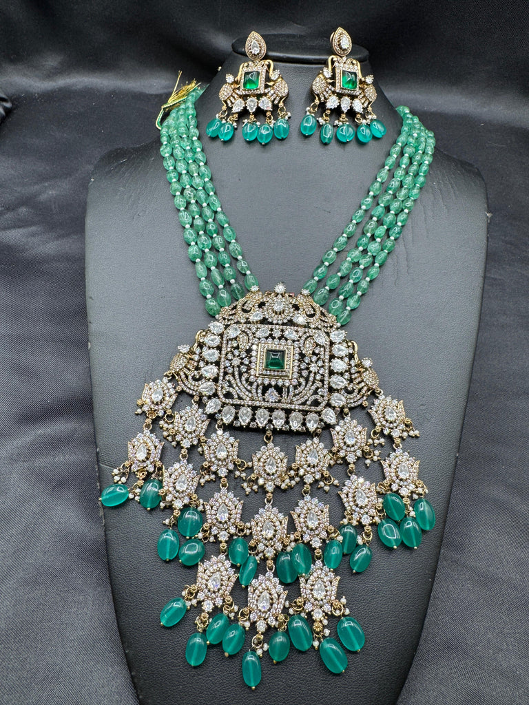 Emerald strawberry beads with Mossanite stones grand pendant with matching jewelry