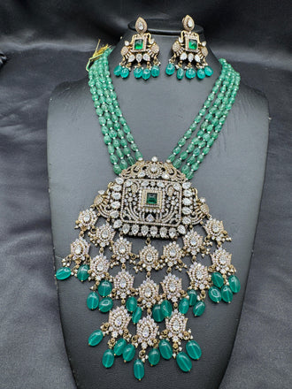 Emerald strawberry beads with Mossanite stones grand pendant with matching jewelry