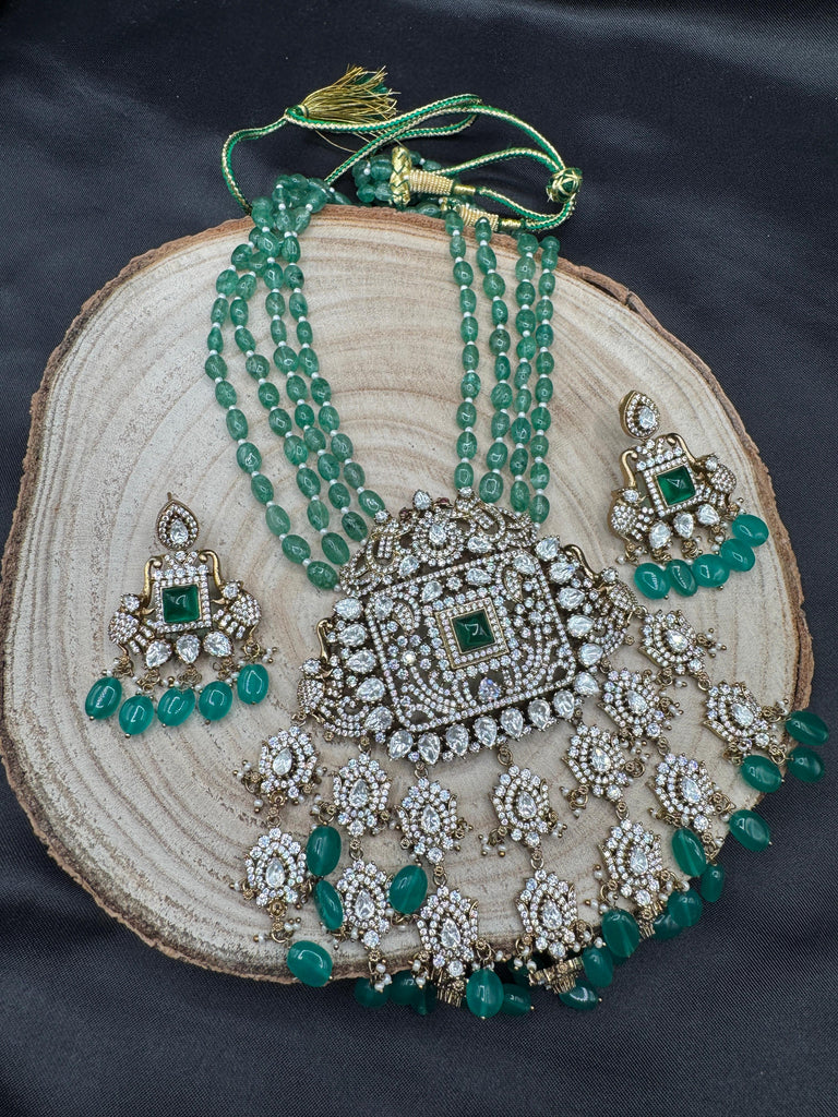 Emerald strawberry beads with Mossanite stones grand pendant with matching jewelry