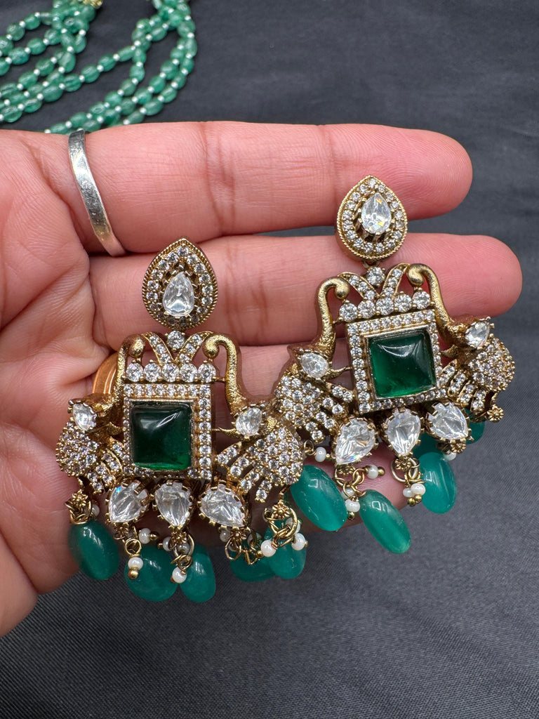 Emerald strawberry beads with Mossanite stones grand pendant with matching jewelry