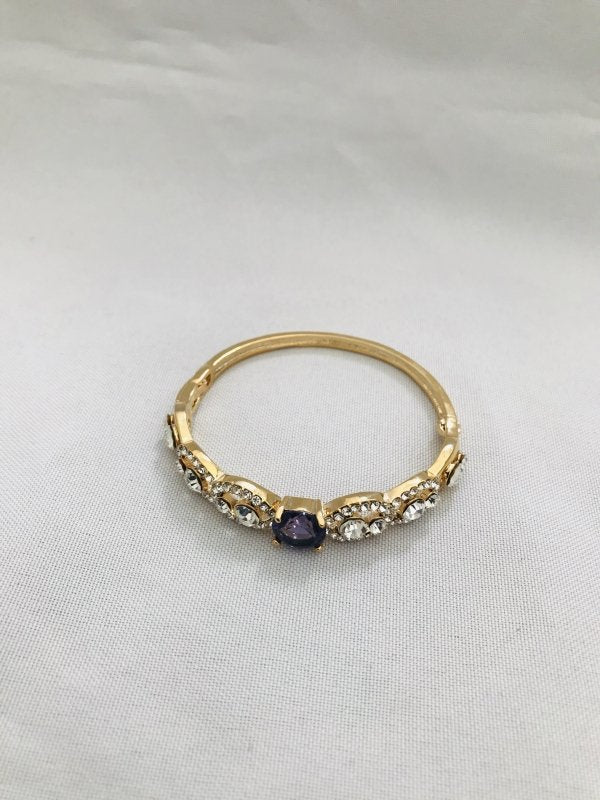 Elegant cz stones with purple stone side lock bracelet - Globus Fashions