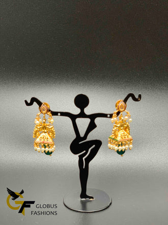 Traditional peacock design with pearls jumka earrings