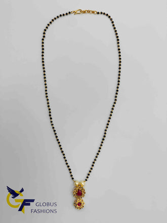 Uncut cz stones with ruby stones pendant with a single line black beads chain