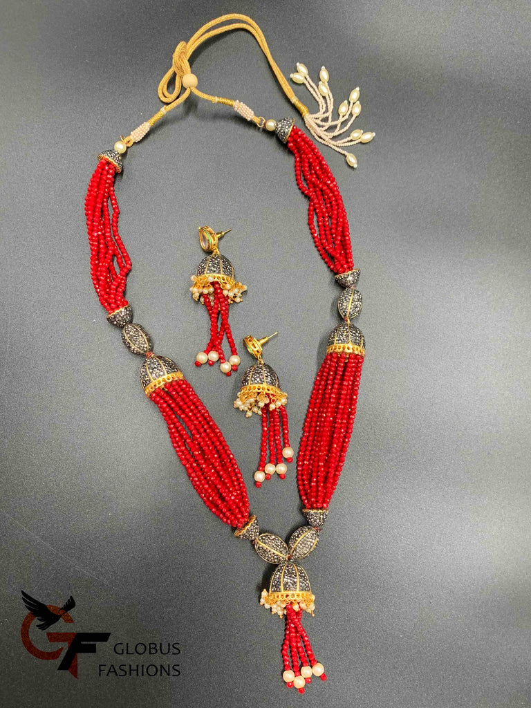 Red color beads with black stones pendant and matching jumka earrings