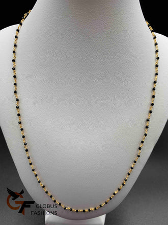 Single line black diamond beads with a gold twisted elegant chain