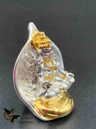 Beautiful leaf design back with silver Lakshmi Devi idol