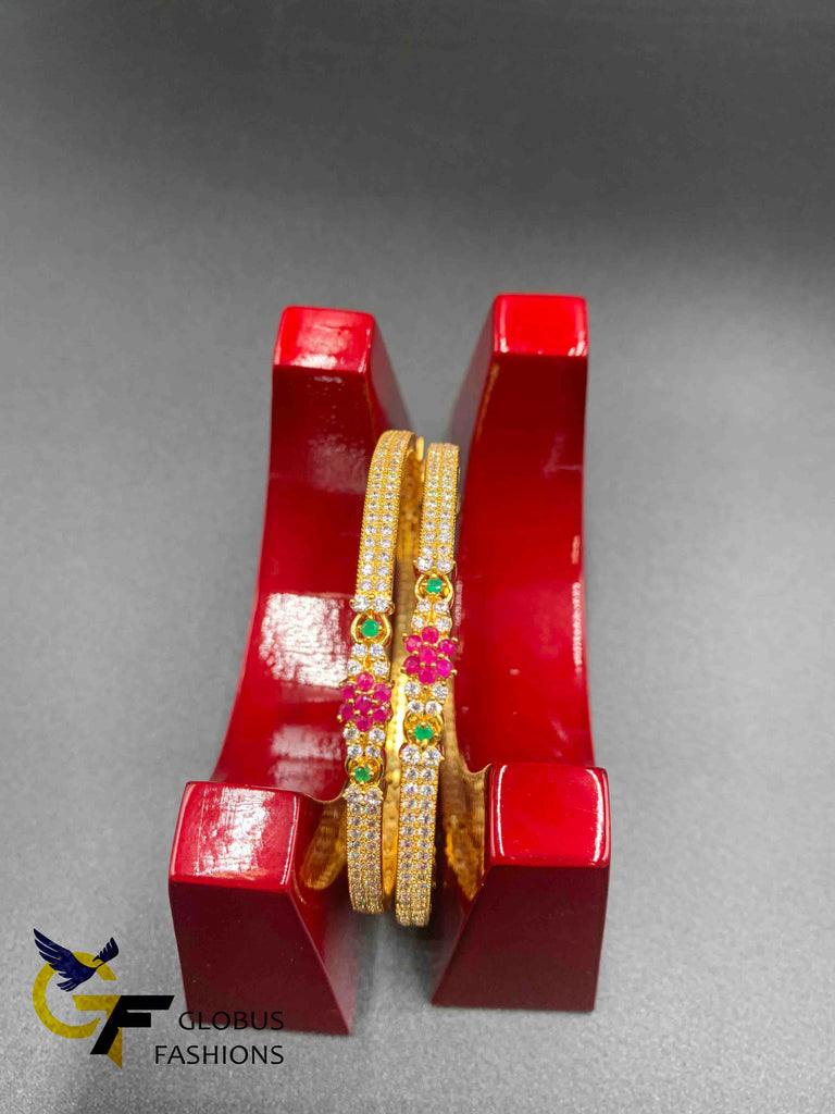 The multicolor stone flower design with cz stones set of two bangles