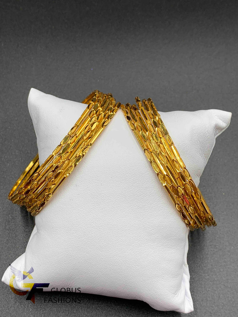 Designed gold set of 12 bangles