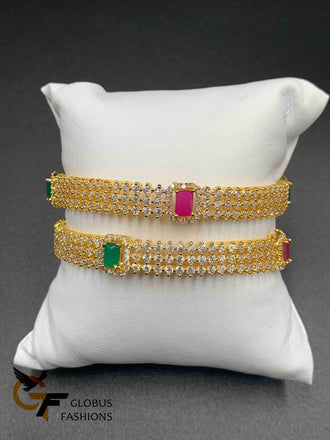 Cz stones and square-shaped ruby and emerald bangles