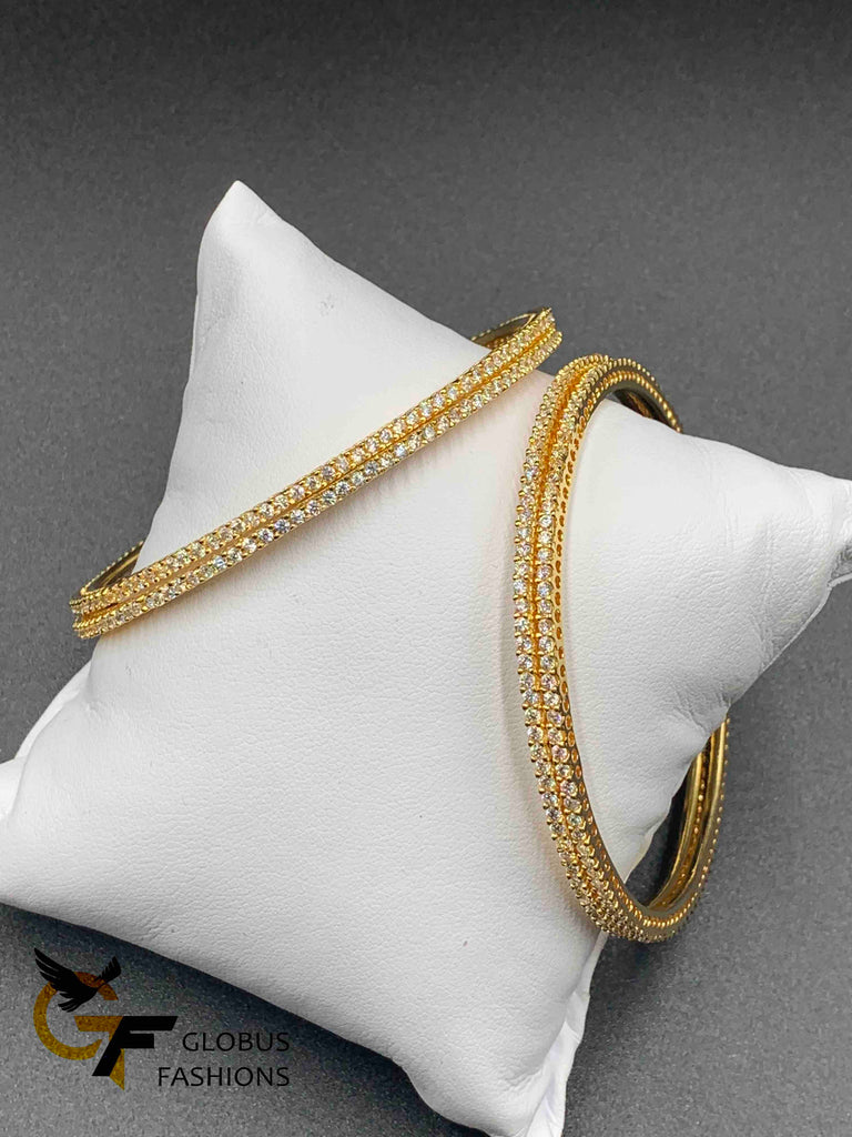 Single line cz stones set of four bangles