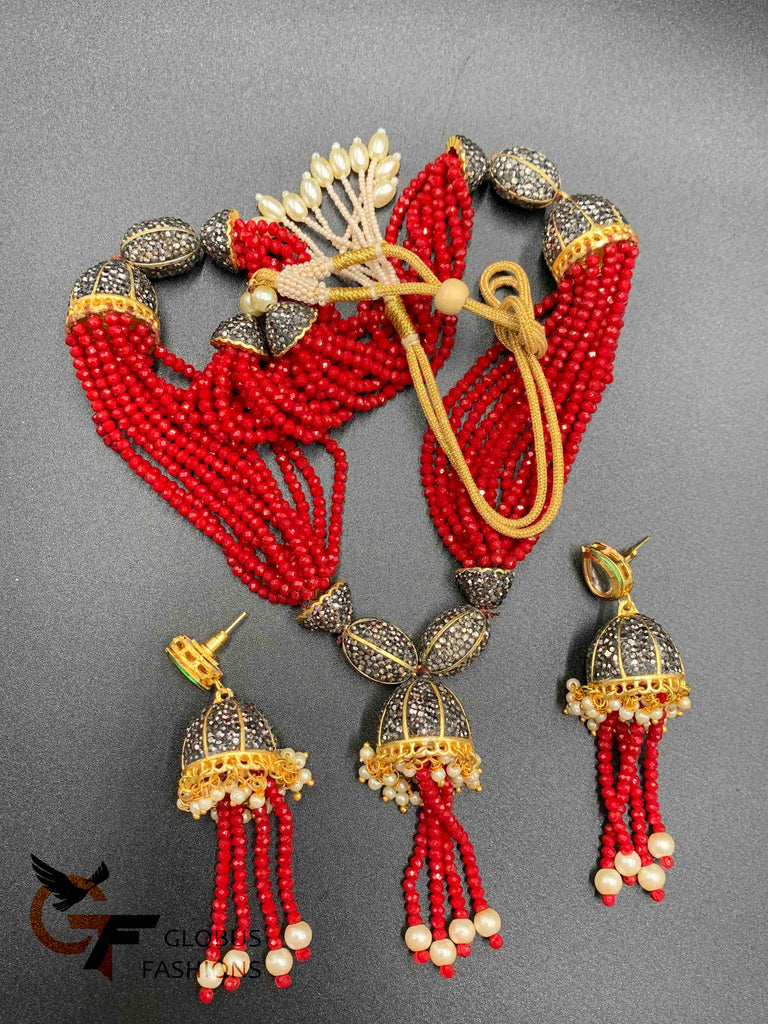 Red color beads with black stones pendant and matching jumka earrings