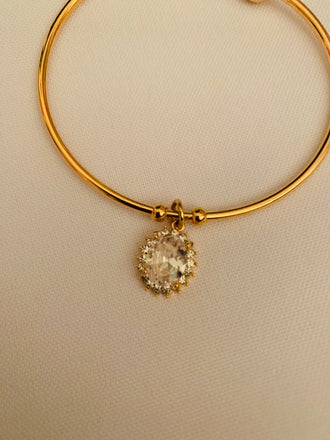 Cz stones locket with gold kada bracelet