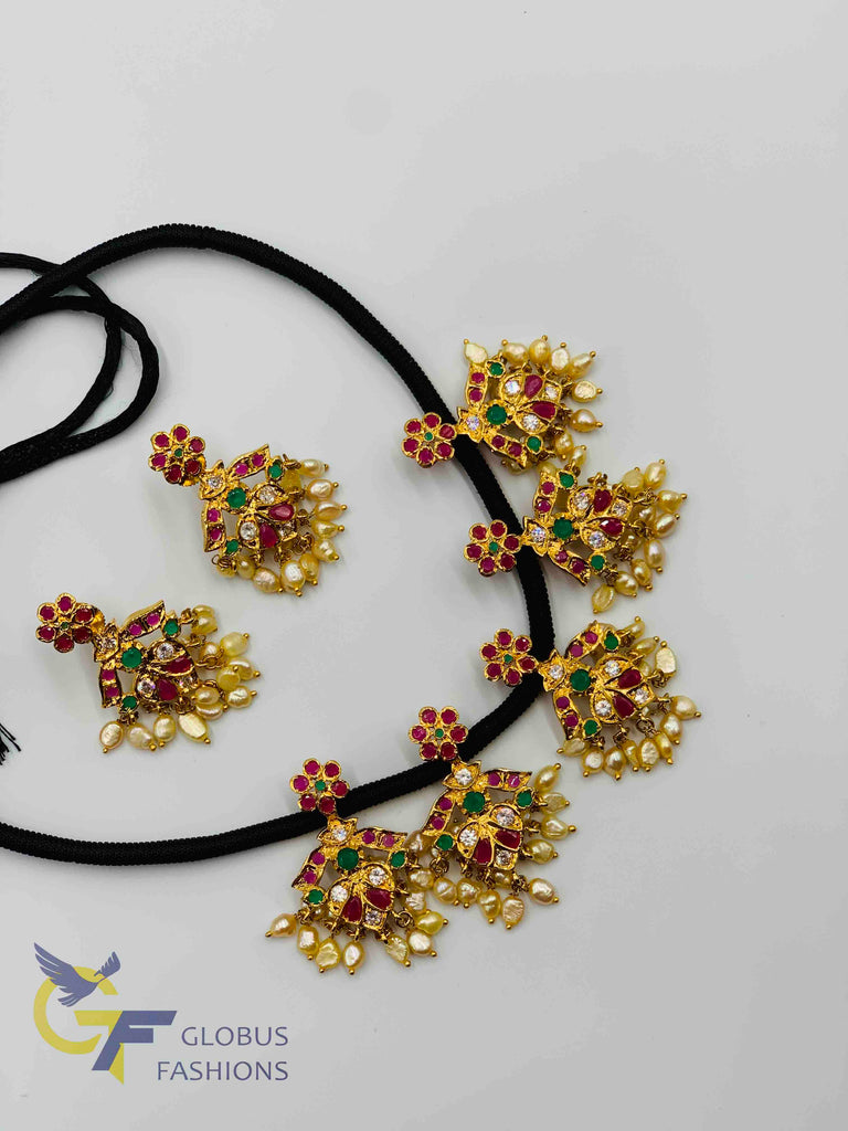Beautiful multicolor stones and pearls with black thread
