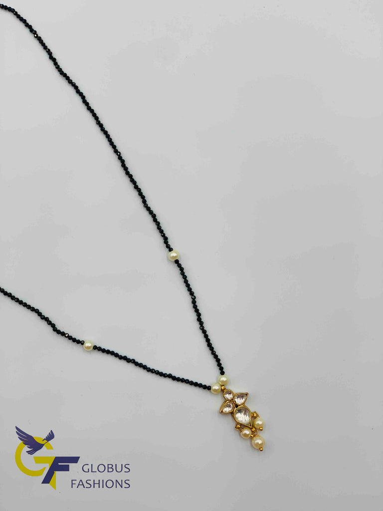 Single line black beads chain with kundan stones pendant