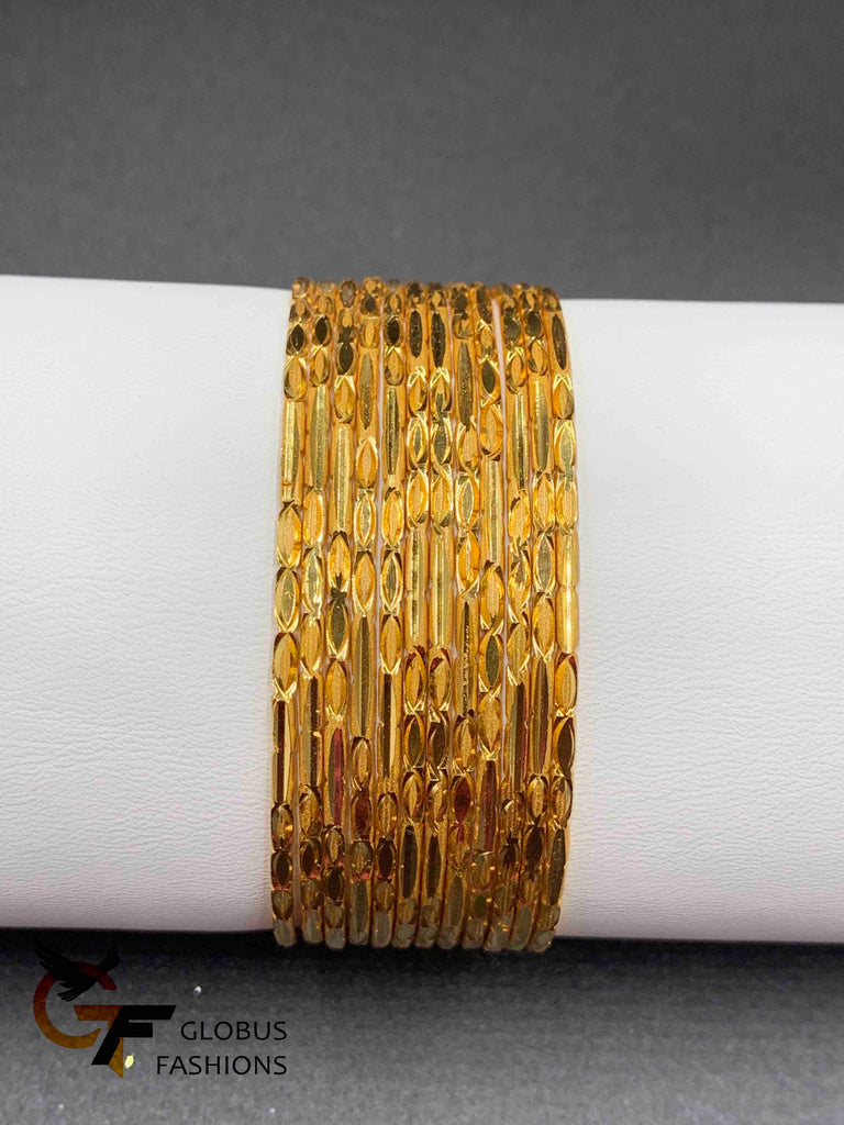Designed gold set of 12 bangles