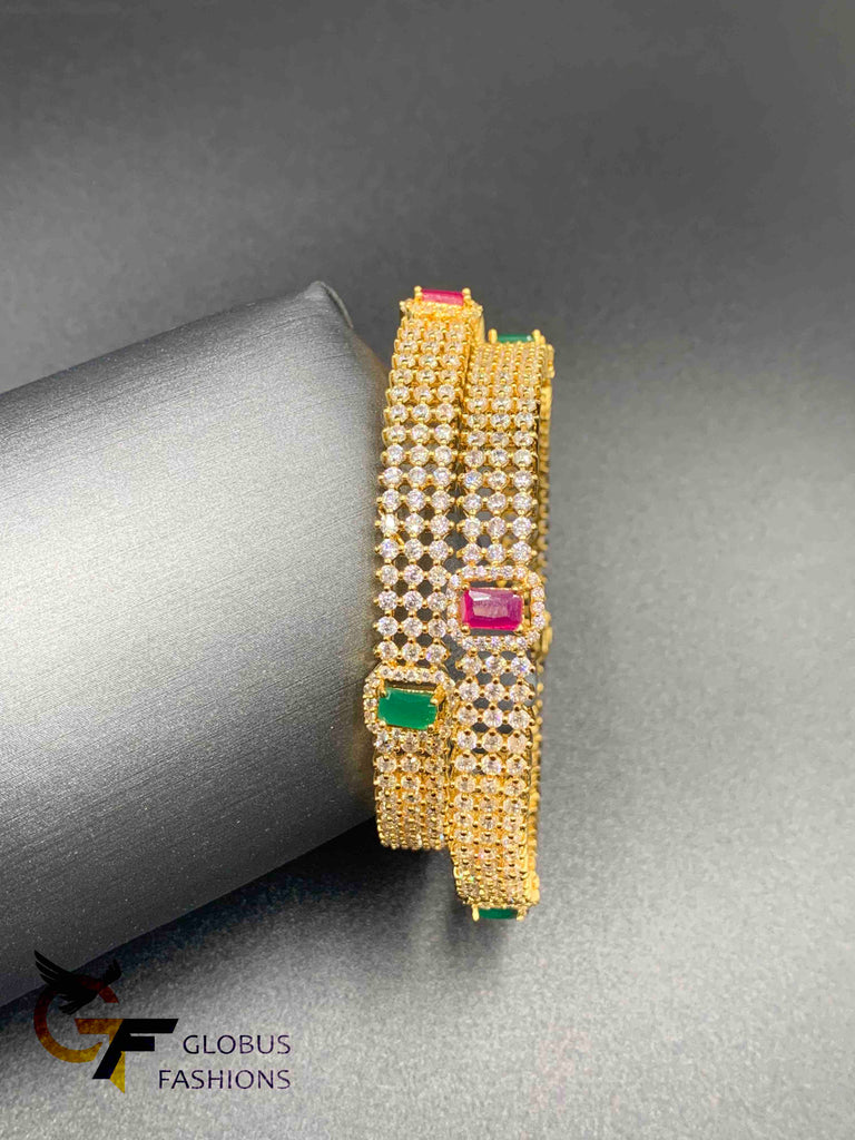 Cz stones and square-shaped ruby and emerald bangles