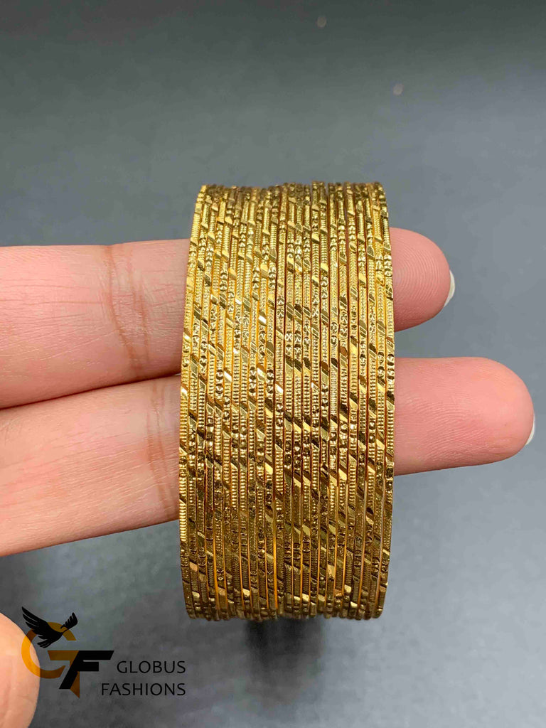 Set of 24 gold self-designed gold bangles