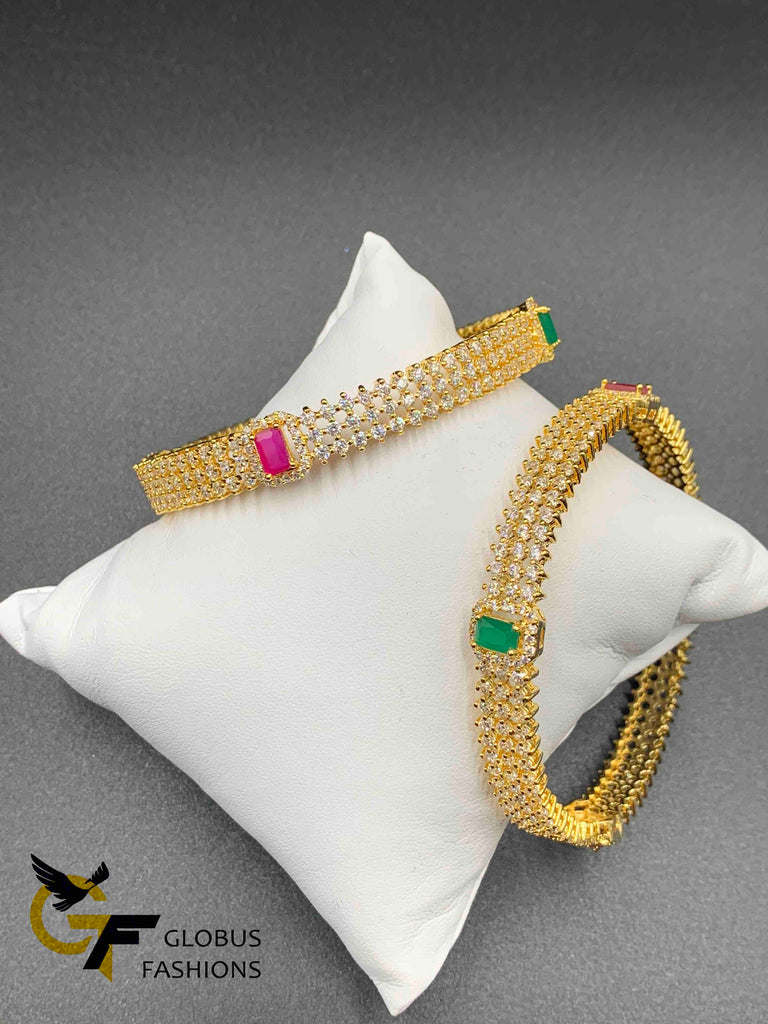 Cz stones and square-shaped ruby and emerald bangles