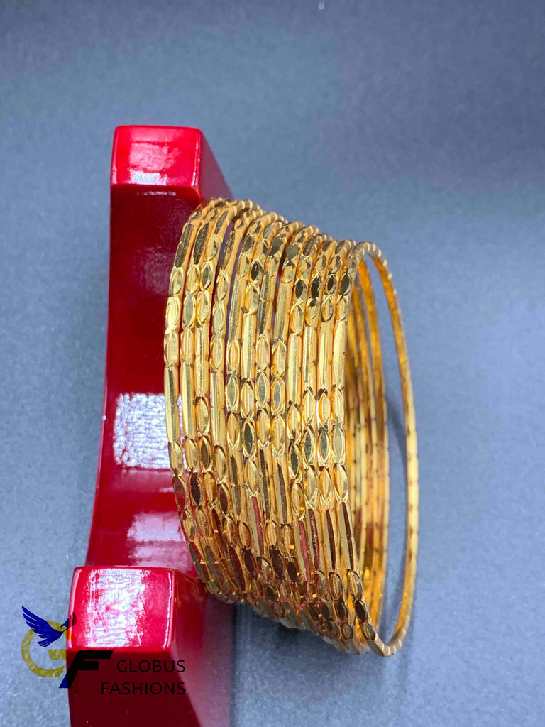 Designed gold set of 12 bangles