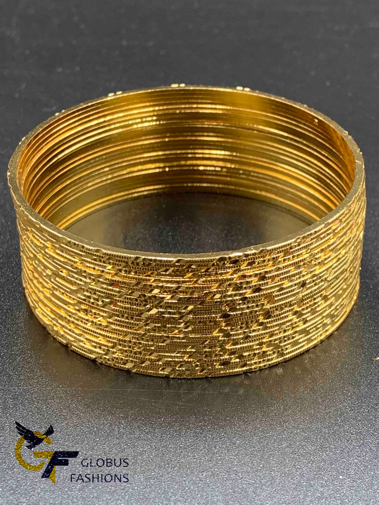 Set of 24 gold self-designed gold bangles