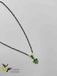 Emerald stones pendant with a single line black beads chain