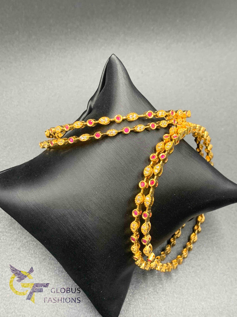 Cz stones and ruby stones simple design set of four bangles