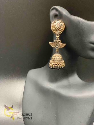 Swand and peacock design silver long jumka earrings