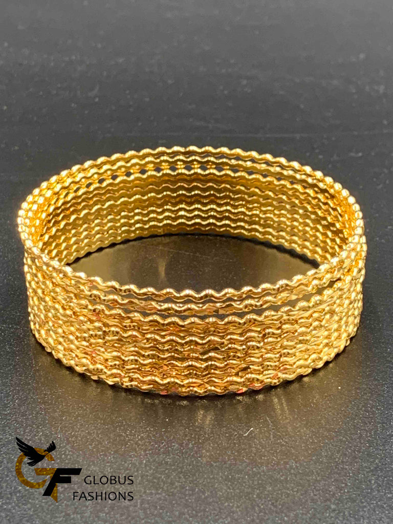 Plain gold zigzag design set of 24 bangles