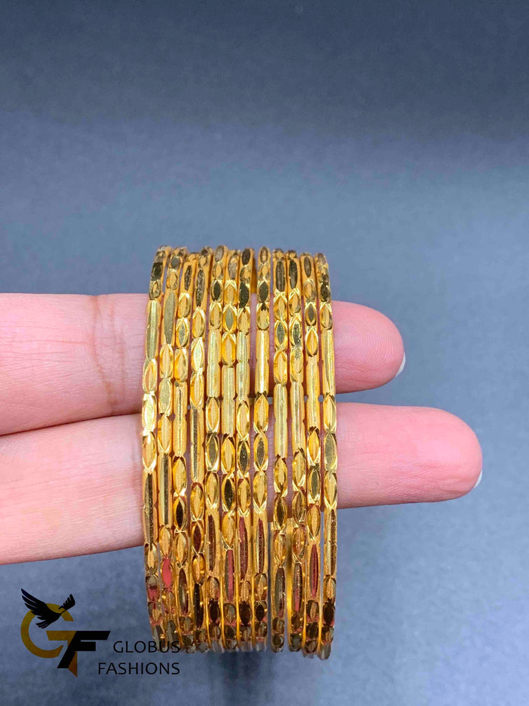 Designed gold set of 12 bangles